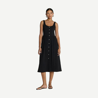 Jet black Nation LTD Laurel midi dress displayed on a hanger, featuring a fitted silhouette and elegant midi length.