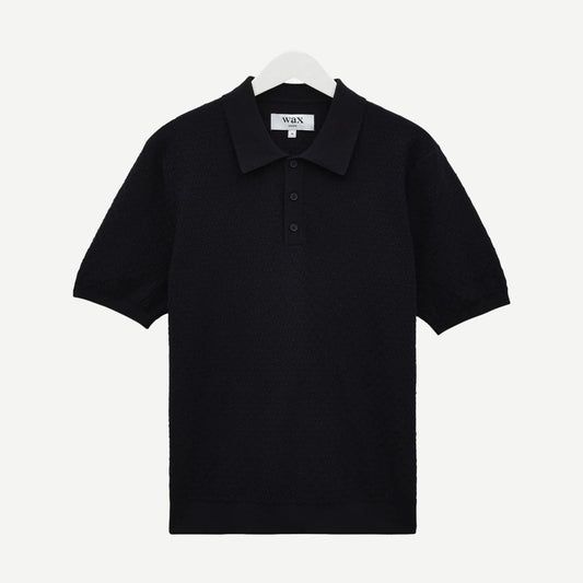 Navy Naples Polo Retro Diamond by Wax London featuring a classic knitted design and diamond pattern, displayed on a plain background.