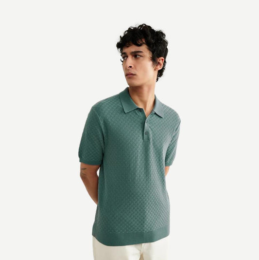Sea green Naples Polo Retro Diamond by Wax London, knitted polo shirt with diamond pattern, front view showing collar and design details.