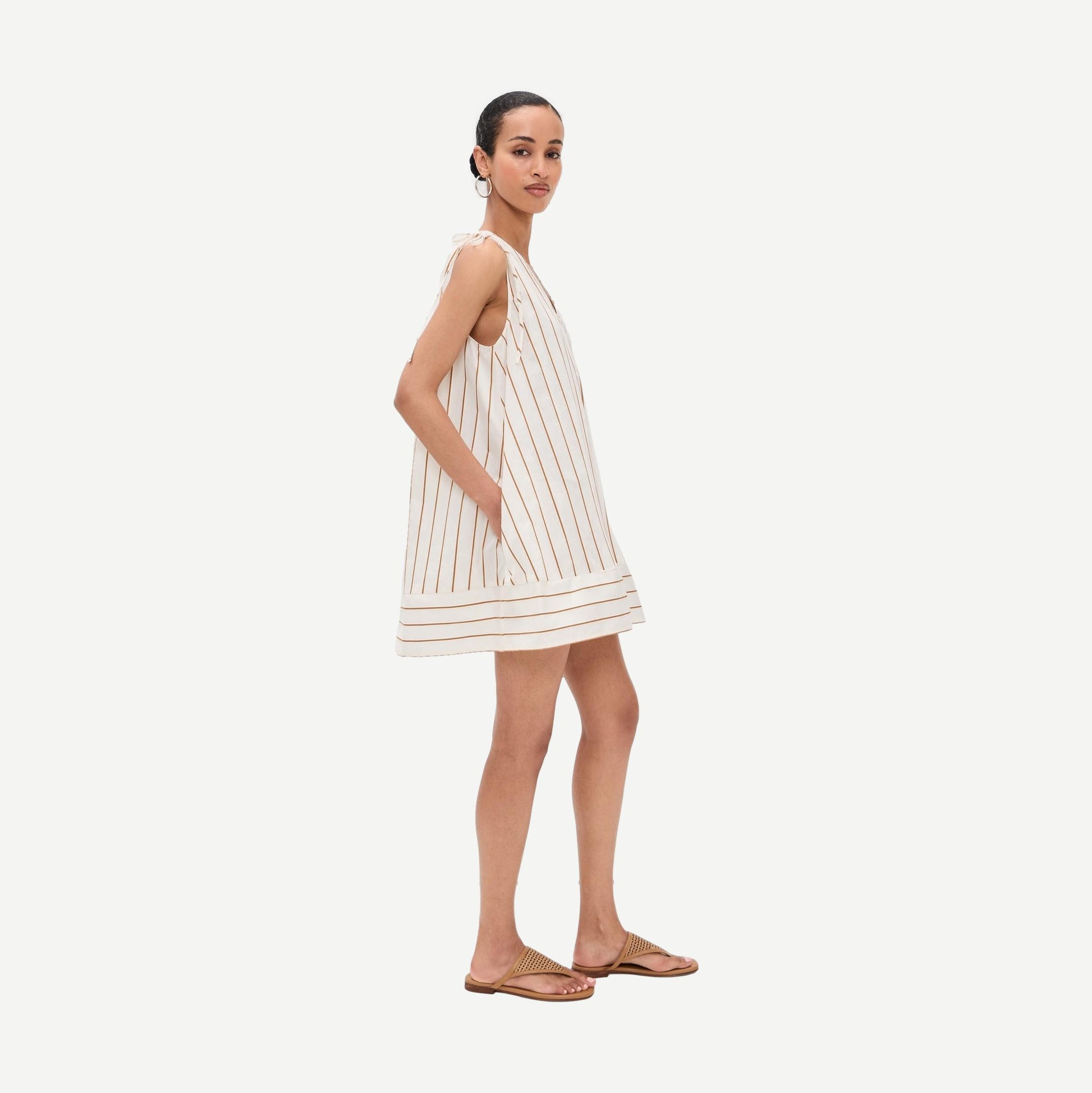 Staud Elena Dress in Solana Stripe featuring a stylish, lightweight fabric and a flowy silhouette with bold stripe patterns.