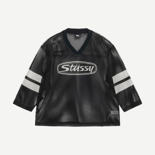 Black Stussy Trucker Team Jersey shirt with a relaxed fit, featuring classic trucker style and bold branding.
