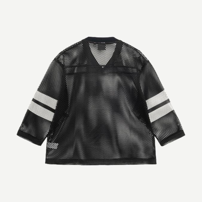 Black Stussy Trucker Team Jersey shirt with logo detail, casual streetwear style, displayed on a plain background.