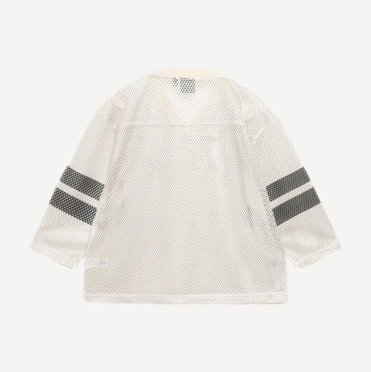 Tan Stussy Trucker Team Jersey shirt with logo embroidery and classic trucker style, displayed on a plain background.